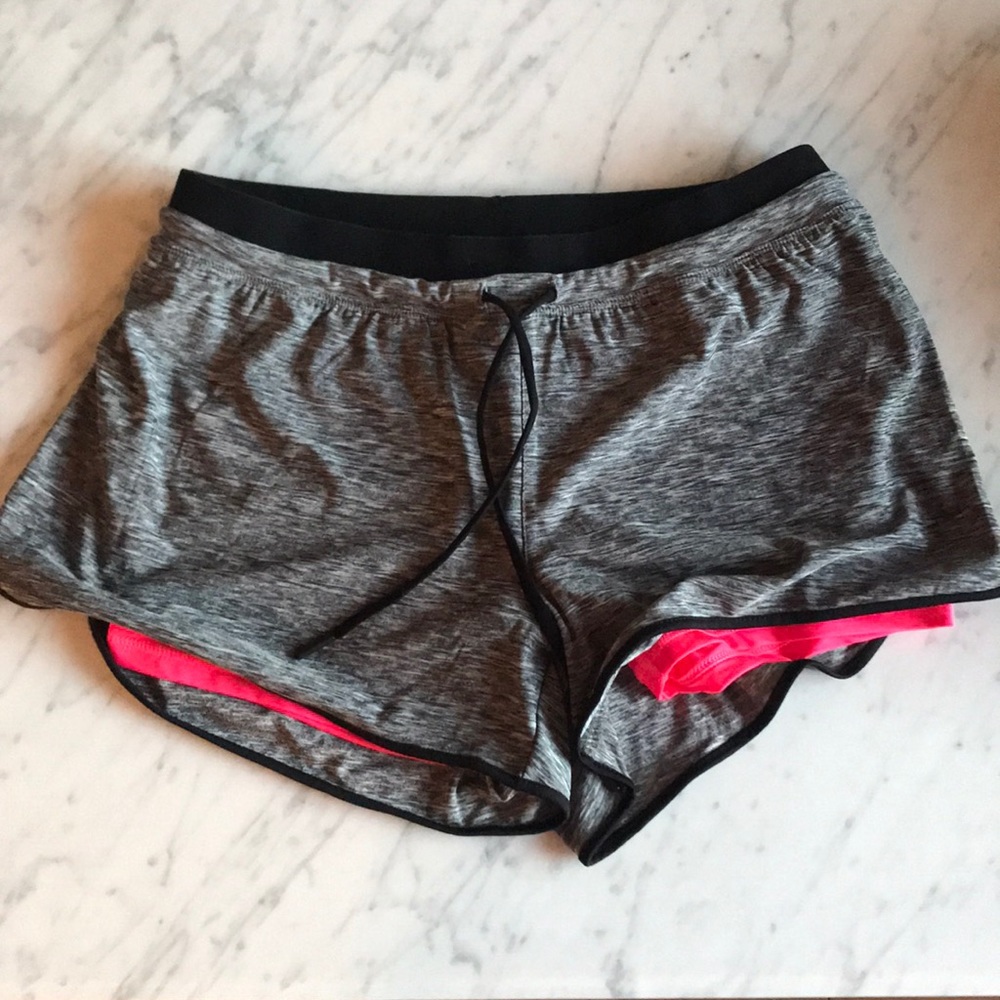 Black and pink workout shorts
